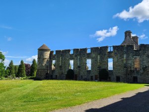 A side view of Falkland Palace, focusing on the King and Queen's quarters ruins