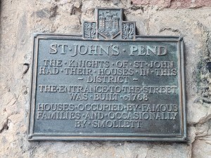 A sign mentioning St. John's Pend and Tobias Smollett