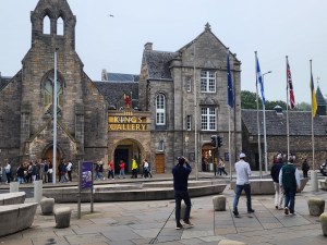 Outside buildings to Holyrood Palace, including an entrance into the shop