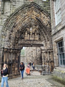 A large arch allowing entrance to the Holyrood Abbey ruins