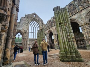 Inside the Abbey, there is open space and broken, but supporting pillars that must have helped hold up the roof.