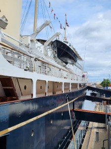 Closeup of the side of the ship, with entrance gangplanks