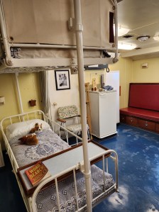 A bed for a sick patient in the ship's sickbay
