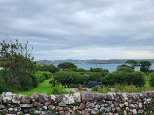 A view of herb gardens with the Sound of Mull in the background