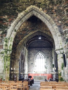 The Iona Abbey great stone arch over the altar space.