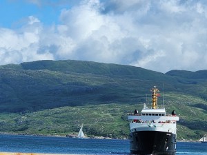 The CalMac ferry to Mull on a backdrop of Mull's mountains
