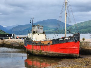 A large fishing trawler docked a Loch Fyne, called The Vital Spark