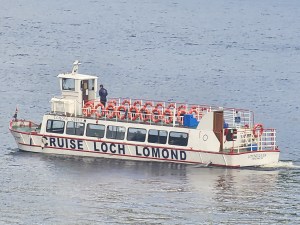 A small cruise ship on Loch Lomond