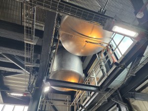 Two large drums as taken from below; they are whisky washbacks